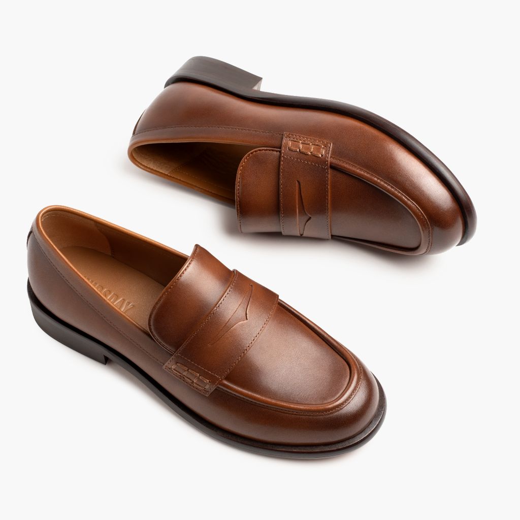 High-Traction Rubber Outsole & Lug Tread Pattern on Dress Penny Pecan أحذية بوت جلدية نسائي