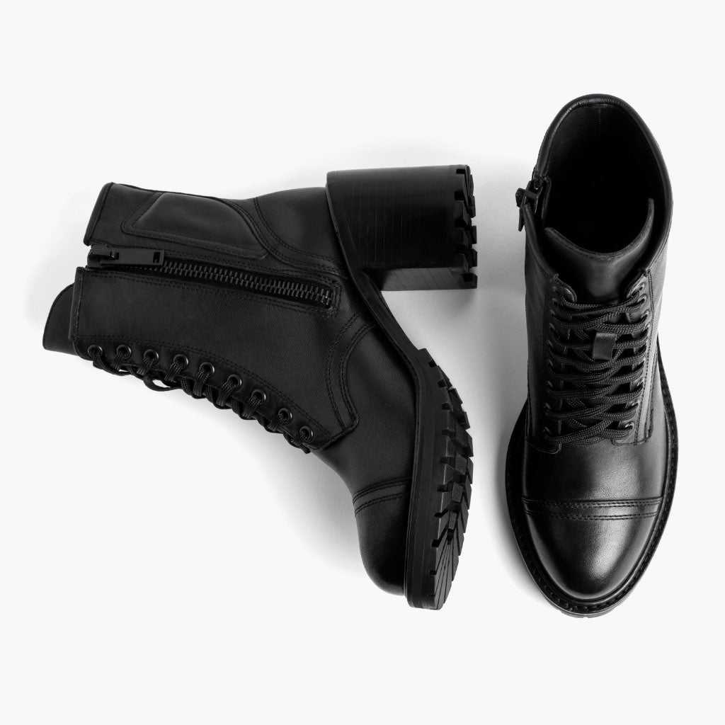 High-Traction Rubber Outsole & Lug Tread Pattern on Rebel أسود أحذية بوت جلدية نسائي