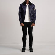 Close-Up Detail of Removable faux fur collar &amp; Zipper Hardware on Clyde B-15 أزرق جاكيت بومبر جلد رجالي