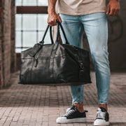 
Classic 100% Full-Grain Leather Duffle Bag - عرض خلفي يوضح أحزمة الجلد المقواة والخياطة المتقنة