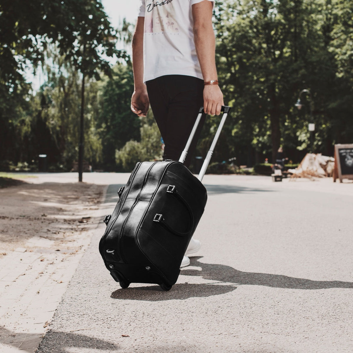 Classic 100% Full-Grain Leather Duffle Bag - Rear Perspective Showing Reinforced Leather Straps &amp; Stitching