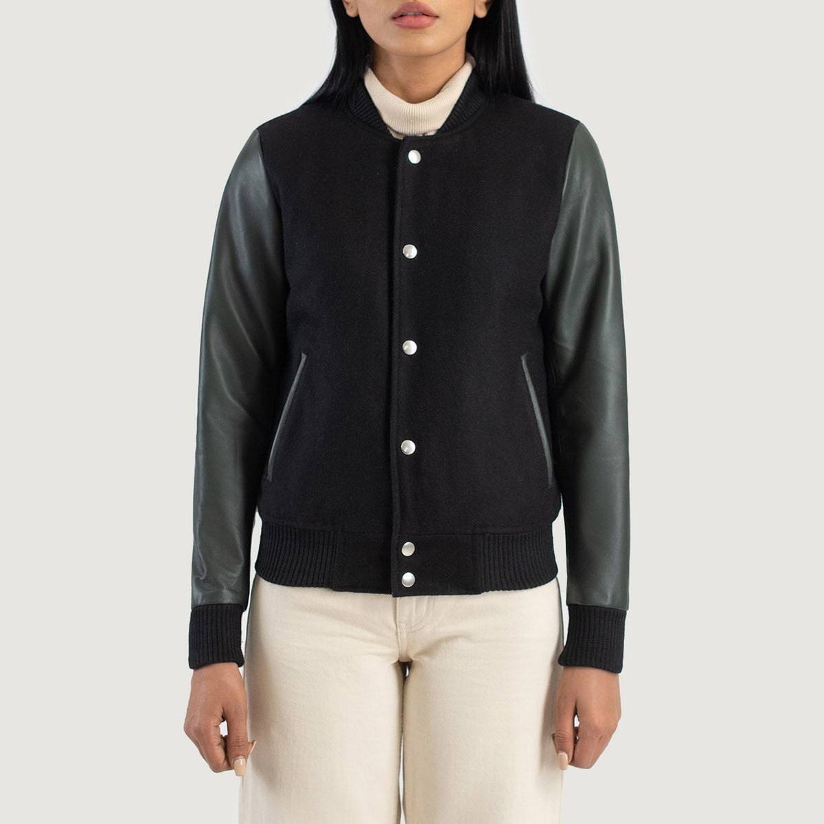 
تفاصيل مقربة of Varsity & Snap Buttons Hardware on Savant Green Hybrid Varsity Jacket