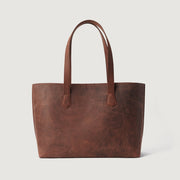 
The Bianca Vintage Distressed Brown Leather Tote Bag For Women - عرض جانبي يوضح عمق الحقيبة وسعة التخزين